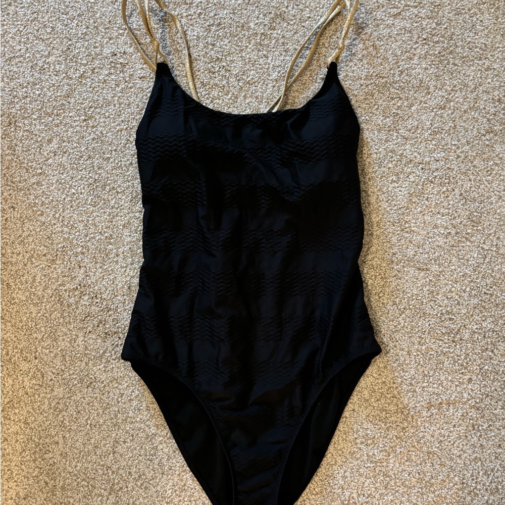 Aerie black one piece women’s swim suit with gold straps